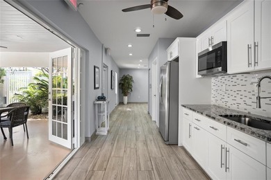 GEORGEOUS CUSTOM DESIGNED, DECORATED AND FURNISHED 3 BED TWO & on Palm-Aire Country Club and Resort - The Oaks in Florida - for sale on GolfHomes.com, golf home, golf lot