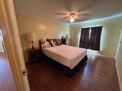 Don't miss this immaculate 2BR/2BA, 1248 sq. ft. home in the on Lake Henry Golf Club in Florida - for sale on GolfHomes.com, golf home, golf lot