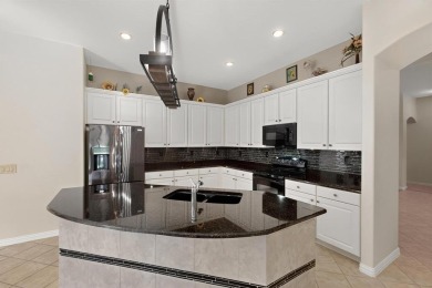 Charming 3-bedroom Trova with extended golf cart garage and on Wildhorse Golf Club of Robson Ranch in Texas - for sale on GolfHomes.com, golf home, golf lot