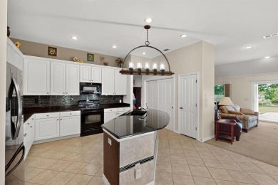 Charming 3-bedroom Trova with extended golf cart garage and on Wildhorse Golf Club of Robson Ranch in Texas - for sale on GolfHomes.com, golf home, golf lot