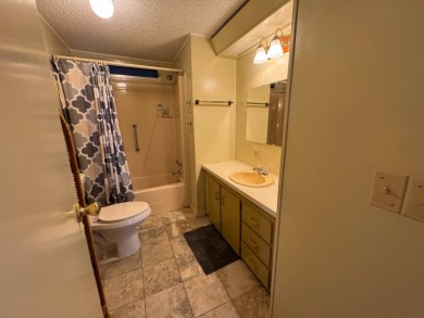 Don't miss this immaculate 2BR/2BA, 1248 sq. ft. home in the on Lake Henry Golf Club in Florida - for sale on GolfHomes.com, golf home, golf lot