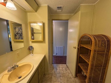 Don't miss this immaculate 2BR/2BA, 1248 sq. ft. home in the on Lake Henry Golf Club in Florida - for sale on GolfHomes.com, golf home, golf lot