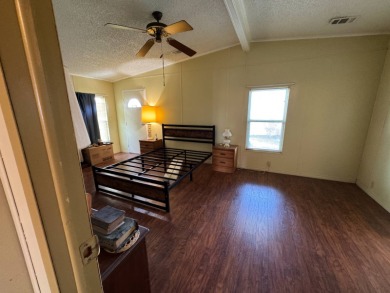 Don't miss this immaculate 2BR/2BA, 1248 sq. ft. home in the on Lake Henry Golf Club in Florida - for sale on GolfHomes.com, golf home, golf lot