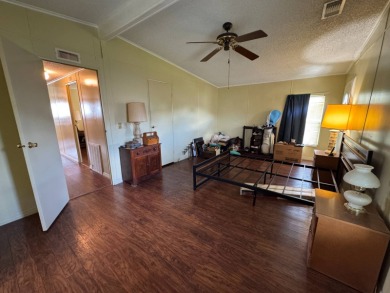 Don't miss this immaculate 2BR/2BA, 1248 sq. ft. home in the on Lake Henry Golf Club in Florida - for sale on GolfHomes.com, golf home, golf lot