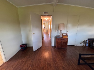 Don't miss this immaculate 2BR/2BA, 1248 sq. ft. home in the on Lake Henry Golf Club in Florida - for sale on GolfHomes.com, golf home, golf lot