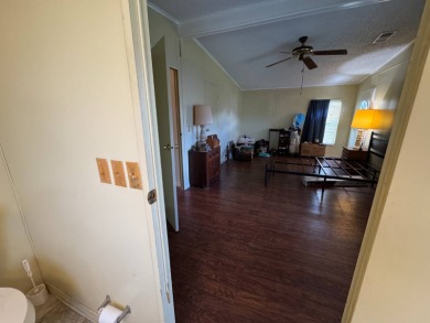 Don't miss this immaculate 2BR/2BA, 1248 sq. ft. home in the on Lake Henry Golf Club in Florida - for sale on GolfHomes.com, golf home, golf lot