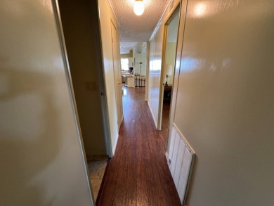 Don't miss this immaculate 2BR/2BA, 1248 sq. ft. home in the on Lake Henry Golf Club in Florida - for sale on GolfHomes.com, golf home, golf lot