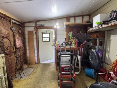 Don't miss this immaculate 2BR/2BA, 1248 sq. ft. home in the on Lake Henry Golf Club in Florida - for sale on GolfHomes.com, golf home, golf lot
