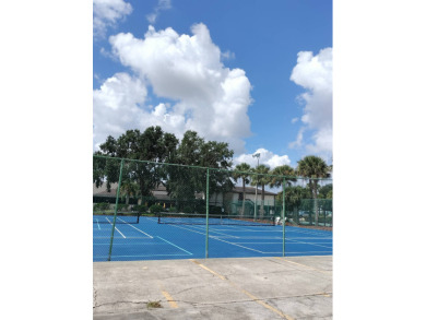 Don't miss this immaculate 2BR/2BA, 1248 sq. ft. home in the on Lake Henry Golf Club in Florida - for sale on GolfHomes.com, golf home, golf lot