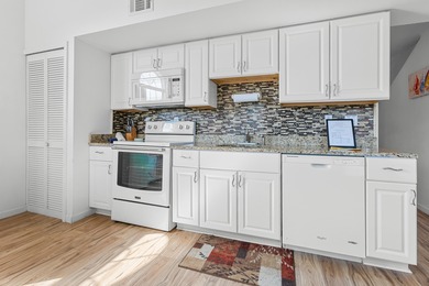 Penthouse Waterfront 2 Bedroom 2 Bath with gorgeous up- close on Pointe Royale Village Country Club in Missouri - for sale on GolfHomes.com, golf home, golf lot