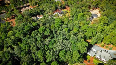 Nestled in the serene community of Seven Lakes South, this prime on Seven Lakes Country Club in North Carolina - for sale on GolfHomes.com, golf home, golf lot