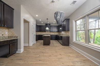 Tucked into the storybook charm of Eagle Pointe--just across the on Lakewood Golf Course in Alabama - for sale on GolfHomes.com, golf home, golf lot