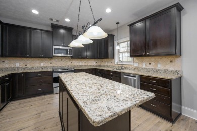Tucked into the storybook charm of Eagle Pointe--just across the on Lakewood Golf Course in Alabama - for sale on GolfHomes.com, golf home, golf lot