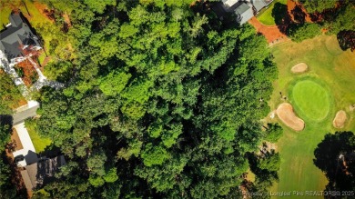 Nestled in the serene community of Seven Lakes South, this prime on Seven Lakes Country Club in North Carolina - for sale on GolfHomes.com, golf home, golf lot