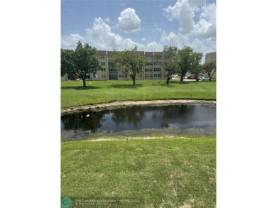 Beautiful 2BR/2BA Condo in *The Island* at Sunrise Lakes - 55+ on Sunrise Lakes Phase IV Golf Course in Florida - for sale on GolfHomes.com, golf home, golf lot