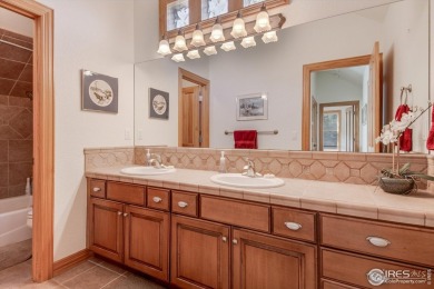 Welcome home to Fox Acres Country Club, a private, gated on Fox Acres Country Club in Colorado - for sale on GolfHomes.com, golf home, golf lot