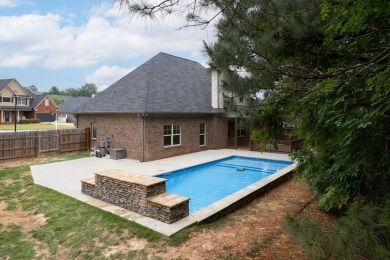 Tucked into the storybook charm of Eagle Pointe--just across the on Lakewood Golf Course in Alabama - for sale on GolfHomes.com, golf home, golf lot