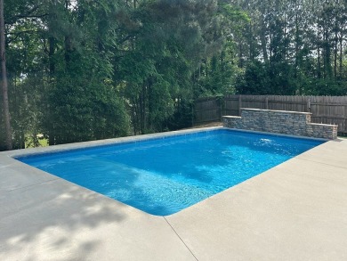 Tucked into the storybook charm of Eagle Pointe--just across the on Lakewood Golf Course in Alabama - for sale on GolfHomes.com, golf home, golf lot