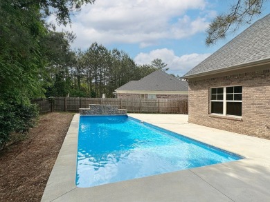 Tucked into the storybook charm of Eagle Pointe--just across the on Lakewood Golf Course in Alabama - for sale on GolfHomes.com, golf home, golf lot