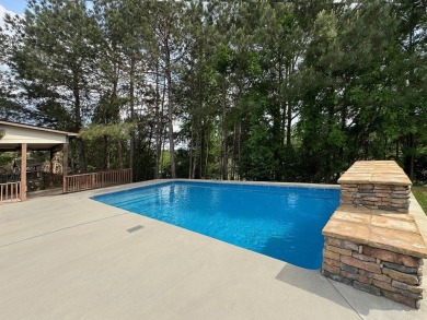 Tucked into the storybook charm of Eagle Pointe--just across the on Lakewood Golf Course in Alabama - for sale on GolfHomes.com, golf home, golf lot