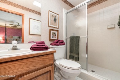 This beautifully designed home was a custom build for television on Indigo Lakes Golf Club in Florida - for sale on GolfHomes.com, golf home, golf lot