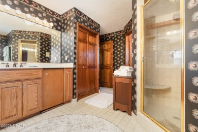 This beautifully designed home was a custom build for television on Indigo Lakes Golf Club in Florida - for sale on GolfHomes.com, golf home, golf lot