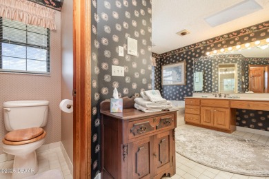 This beautifully designed home was a custom build for television on Indigo Lakes Golf Club in Florida - for sale on GolfHomes.com, golf home, golf lot