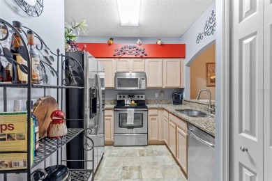 Welcome to this beautifully maintained two-story townhome in the on Heritage Isles Golf and Country Club in Florida - for sale on GolfHomes.com, golf home, golf lot