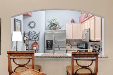Welcome to this beautifully maintained two-story townhome in the on Heritage Isles Golf and Country Club in Florida - for sale on GolfHomes.com, golf home, golf lot