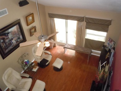 A rarity and a real beauty. Chic best describes this townhome on Holly Lake Ranch Golf Club in Texas - for sale on GolfHomes.com, golf home, golf lot