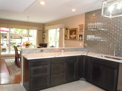 A rarity and a real beauty. Chic best describes this townhome on Holly Lake Ranch Golf Club in Texas - for sale on GolfHomes.com, golf home, golf lot