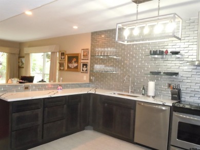 A rarity and a real beauty. Chic best describes this townhome on Holly Lake Ranch Golf Club in Texas - for sale on GolfHomes.com, golf home, golf lot