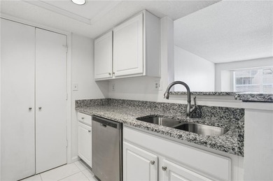 Perched on the top floor and overlooking the sparkling community on North Fulton Golf Course in Georgia - for sale on GolfHomes.com, golf home, golf lot