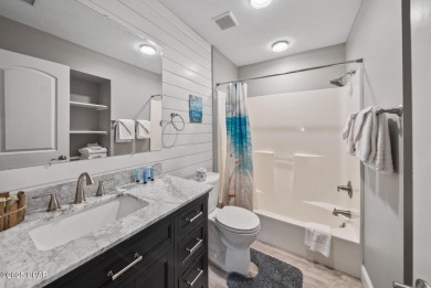 Step into beachside bliss with this newly renovated townhome in on Edgewater Beach Resort in Florida - for sale on GolfHomes.com, golf home, golf lot