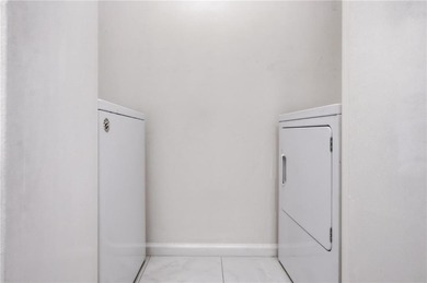 Perched on the top floor and overlooking the sparkling community on North Fulton Golf Course in Georgia - for sale on GolfHomes.com, golf home, golf lot