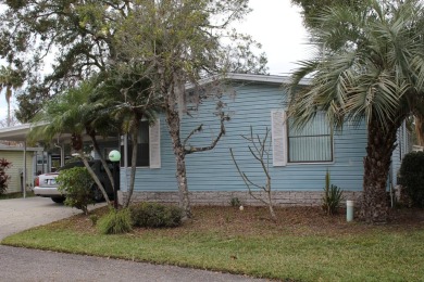 Quaint, clean 3 bedroom PH home, turn key and ready for on Schalamar Creek Golf and Country Club in Florida - for sale on GolfHomes.com, golf home, golf lot