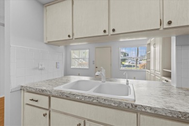 Amazing location in a 55+ community with a heated pool, tennis on Tarpon Springs Golf Course in Florida - for sale on GolfHomes.com, golf home, golf lot