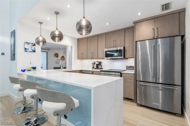 Welcome to your DREAM villa! This COMPLETELY updated 3-bedroom on Twin Isles Country Club in Florida - for sale on GolfHomes.com, golf home, golf lot