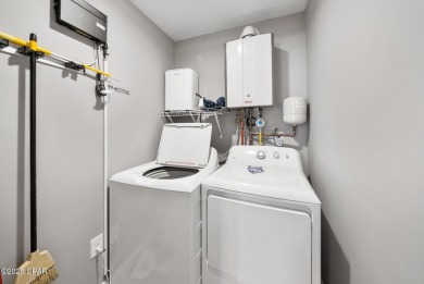 Step into beachside bliss with this newly renovated townhome in on Edgewater Beach Resort in Florida - for sale on GolfHomes.com, golf home, golf lot