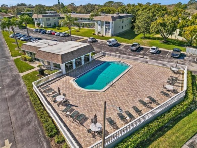Amazing location in a 55+ community with a heated pool, tennis on Tarpon Springs Golf Course in Florida - for sale on GolfHomes.com, golf home, golf lot