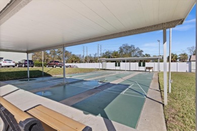 Amazing location in a 55+ community with a heated pool, tennis on Tarpon Springs Golf Course in Florida - for sale on GolfHomes.com, golf home, golf lot