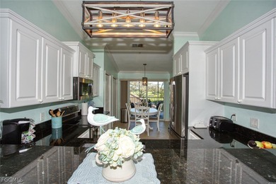 Beautiful second-floor *Barrington* Veranda located in the on Heritage Palms Golf and Country Club in Florida - for sale on GolfHomes.com, golf home, golf lot