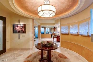 Perched high above the vibrant city, this luxury high-rise condo on Badlands Golf Club in Nevada - for sale on GolfHomes.com, golf home, golf lot