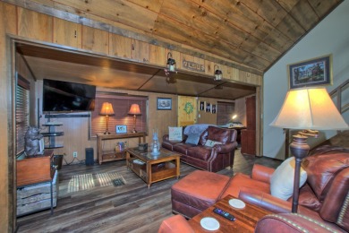 This cozy cabin is nestled among the trees with a view of the on Pendleton Harbor in Texas - for sale on GolfHomes.com, golf home, golf lot