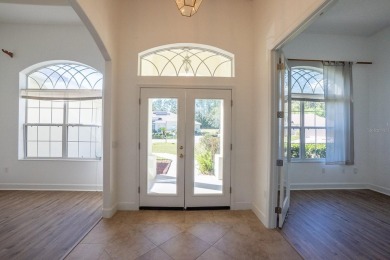 Beautiful 4-bedroom, 3-bathroom home on an oversized lot in on The Grand Club Cypress Course in Florida - for sale on GolfHomes.com, golf home, golf lot