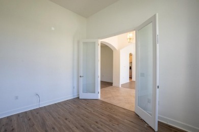 Beautiful 4-bedroom, 3-bathroom home on an oversized lot in on The Grand Club Cypress Course in Florida - for sale on GolfHomes.com, golf home, golf lot