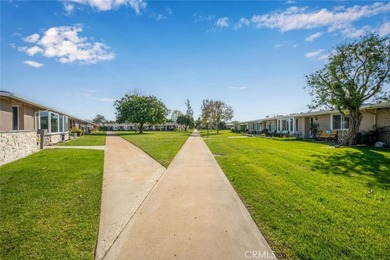 Set within an open, expansive park-like setting, 52i in Mutual 4 on Leisure World Seal Beach Golf Course in California - for sale on GolfHomes.com, golf home, golf lot
