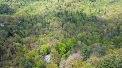 Nestled in the tranquil setting of Holly Forest IV, this on Sapphire National Golf Club in North Carolina - for sale on GolfHomes.com, golf home, golf lot