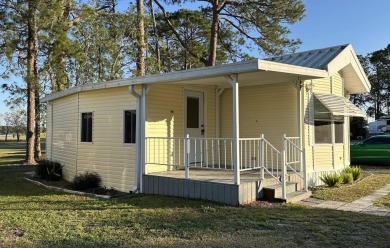 This cute 1 bedroom 1 bath park model with 10x14 bonus room is on Clerbrook Resort, Inc. in Florida - for sale on GolfHomes.com, golf home, golf lot