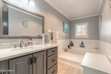 Live every day like it's a beach day in this beautifully on Oceans Golf Club in Florida - for sale on GolfHomes.com, golf home, golf lot